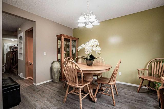 9011 64 Avenue, Home with 4 bedrooms, 2 bathrooms and 2 parking in Grande Prairie AB | Image 2