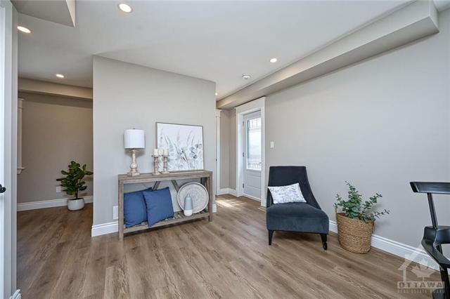 Entrance to living room and handy side door to backyard. | Image 7