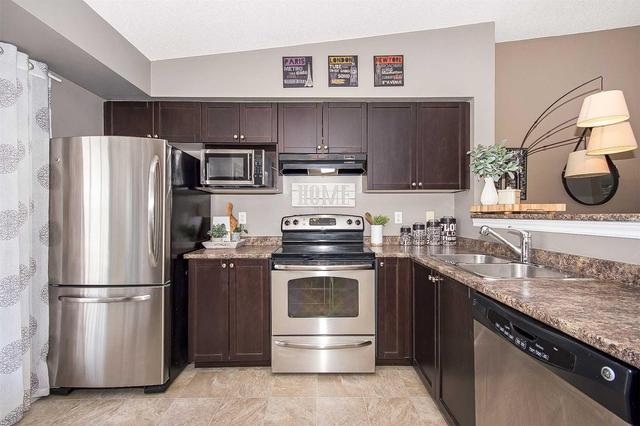407 - 1380 Main St E, Condo with 2 bedrooms, 1 bathrooms and 1 parking in Milton ON | Image 12