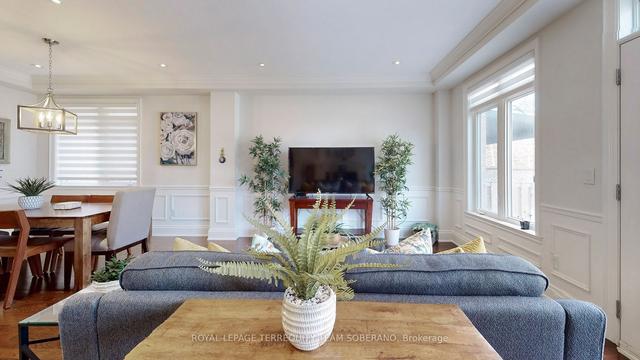 100 Falstaff Ave, House detached with 4 bedrooms, 4 bathrooms and 5.5 parking in Toronto ON | Image 7