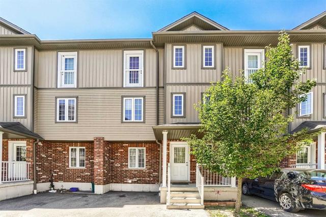 9 - 55 Mooregate Cres, Townhouse with 3 bedrooms, 3 bathrooms and 1 parking in Kitchener ON | Card Image