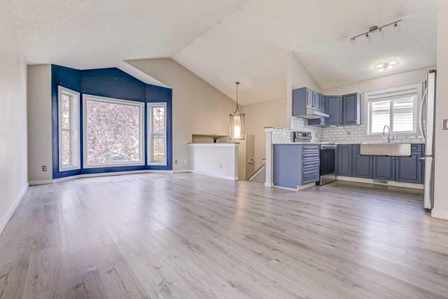 137 Erin Meadow Bay Se, House detached with 3 bedrooms, 2 bathrooms and 1 parking in Calgary AB | Image 5