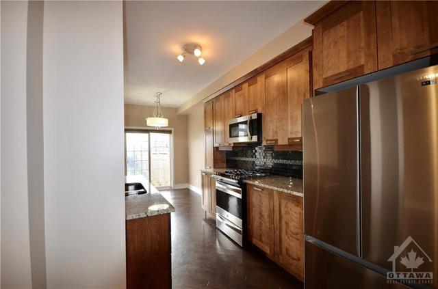 869 Kennacraig Private, Townhouse with 3 bedrooms, 4 bathrooms and 2 parking in Ottawa ON | Image 4