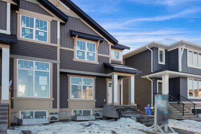 161 Ambleton Drive Nw, Home with 3 bedrooms, 2 bathrooms and 2 parking in Calgary AB | Image 1