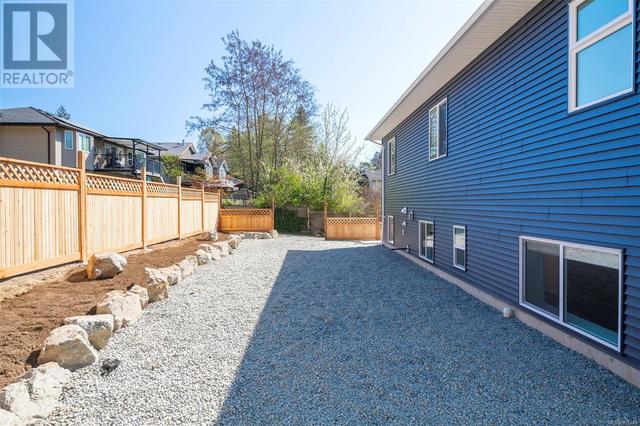 2462 Rosstown Rd, House detached with 6 bedrooms, 4 bathrooms and 4 parking in Nanaimo BC | Image 11