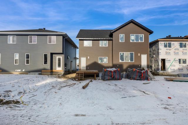 161 Ambleton Drive Nw, Home with 3 bedrooms, 2 bathrooms and 2 parking in Calgary AB | Image 4
