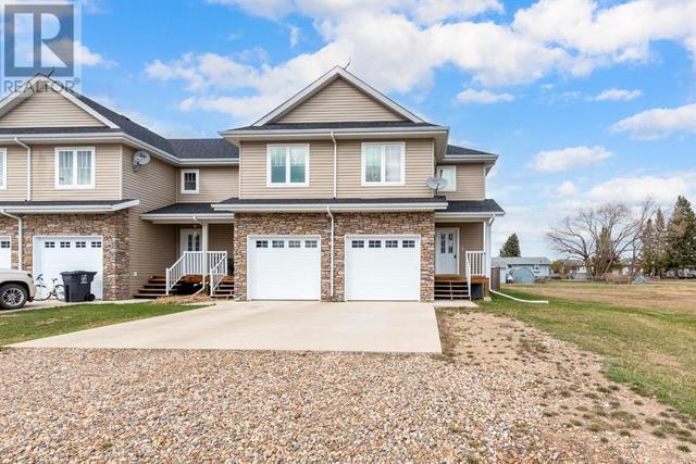 1, - 5002 51 Avenue, House attached with 3 bedrooms, 2 bathrooms and 2 parking in Vermilion River County AB | Card Image