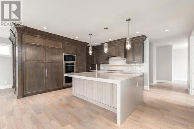 7 Aspen Summit Court Sw, House detached with 6 bedrooms, 3 bathrooms and 2 parking in Calgary AB | Image 7