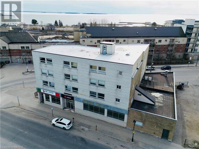 Welcome to 221 Algonquin Avenue. 18 - 1 bed units & 3 Commercial Units | Image 1