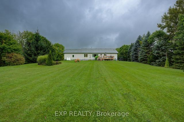 7359 Sideroad 12, House detached with 3 bedrooms, 2 bathrooms and 8 parking in Mapleton ON | Image 34