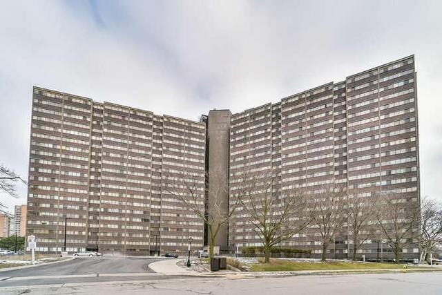 710 - 11 Wincott Dr, Condo with 3 bedrooms, 2 bathrooms and 1 parking in Toronto ON | Image 1
