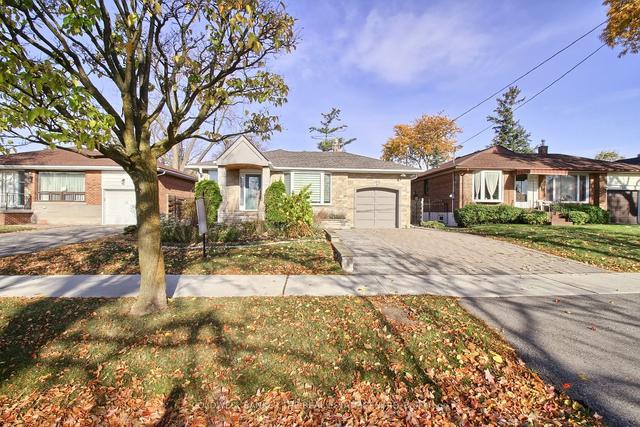 62 Mooreshead Dr, House detached with 3 bedrooms, 2 bathrooms and 5 parking in Toronto ON | Image 23