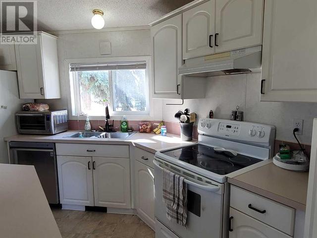 7848 97 Avenue, Home with 3 bedrooms, 2 bathrooms and 2 parking in Peace River AB | Image 10