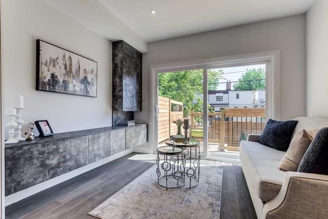 41 Caroline Ave, House semidetached with 3 bedrooms, 3 bathrooms and 2 parking in Toronto ON | Image 6