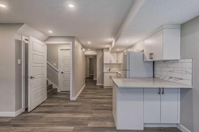 120 Bermuda Road Nw, Home with 4 bedrooms, 2 bathrooms and null parking in Calgary AB | Image 34