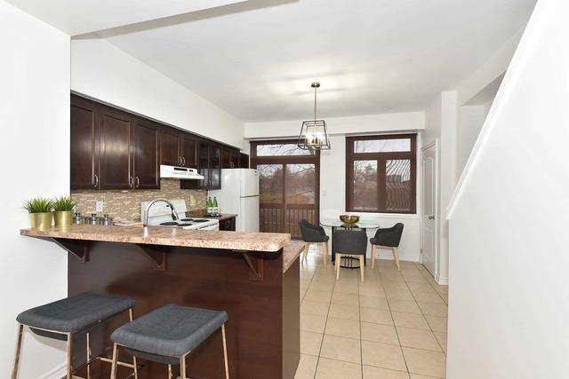 18 Piggot Mews, House attached with 3 bedrooms, 2 bathrooms and 2 parking in Toronto ON | Image 3