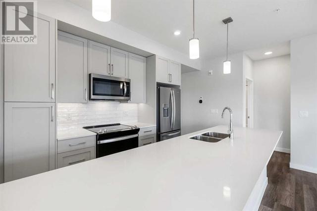 202, - 255 Les Jardins Park Se, Condo with 2 bedrooms, 2 bathrooms and 1 parking in Calgary AB | Image 12