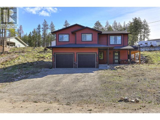 7105 Dunwaters Road, House detached with 4 bedrooms, 2 bathrooms and 4 parking in Central Okanagan West BC | Image 1