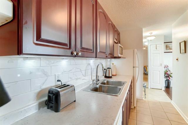 308 - 15 Torrance Rd, Condo with 2 bedrooms, 2 bathrooms and 1 parking in Toronto ON | Image 2