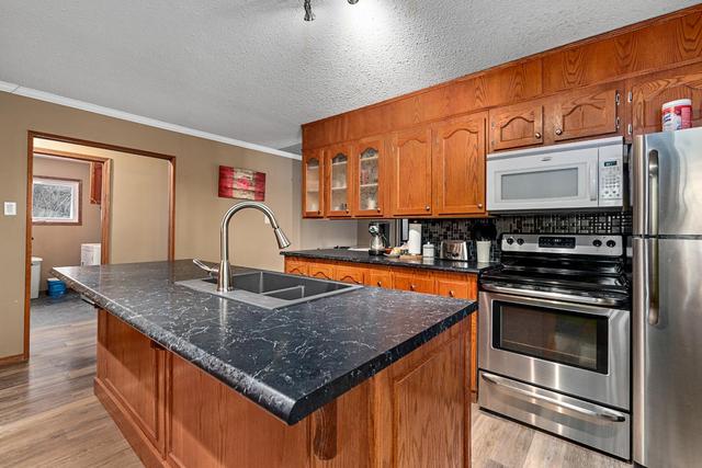 108 2 Street W, House detached with 2 bedrooms, 1 bathrooms and 5 parking in Lashburn SK | Image 11