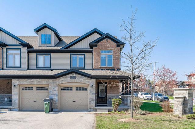 80 Arlington Cres, Townhouse with 3 bedrooms, 3 bathrooms and 2 parking in Guelph ON | Image 1