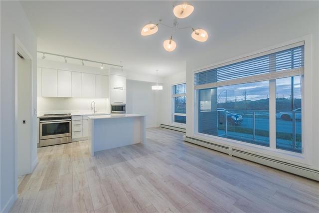 108 - 3125 39 Street Nw, Home with 2 bedrooms, 2 bathrooms and 1 parking in Calgary AB | Image 4