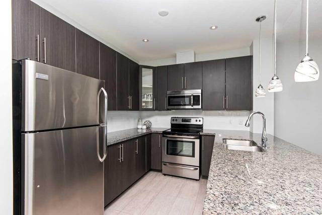 303 - 33 Whitmer St, Condo with 2 bedrooms, 2 bathrooms and 1 parking in Milton ON | Image 3