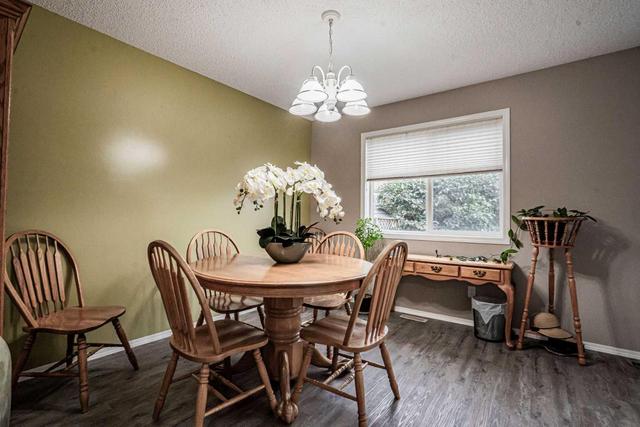 9011 64 Avenue, Home with 4 bedrooms, 2 bathrooms and 2 parking in Grande Prairie AB | Image 4