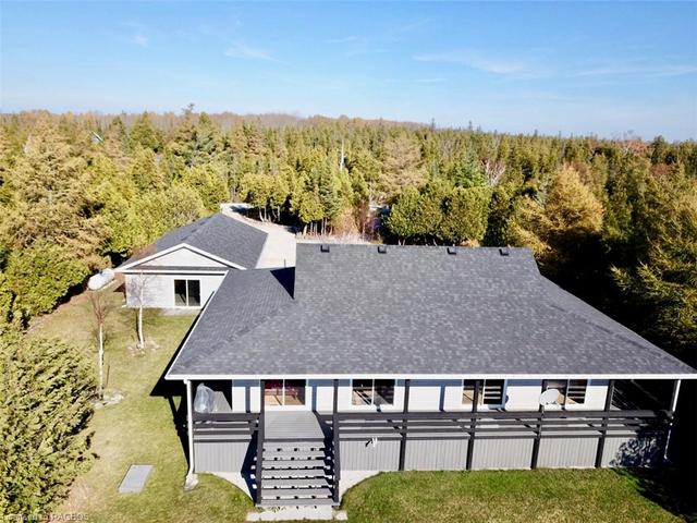 Steps from the front door is the bunkie / guest area. | Image 24