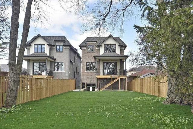 95 Falstaff Ave, House detached with 4 bedrooms, 5 bathrooms and 6 parking in Toronto ON | Image 33