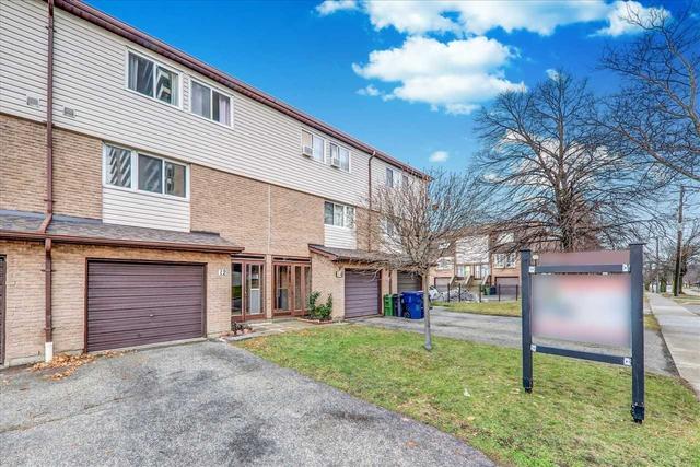 12 Torrance Rd, Townhouse with 3 bedrooms, 3 bathrooms and 2 parking in Toronto ON | Image 1