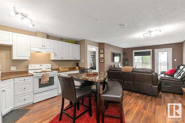 118 - 111 Edwards Dr Sw, Condo with 2 bedrooms, 2 bathrooms and null parking in Edmonton AB | Image 1