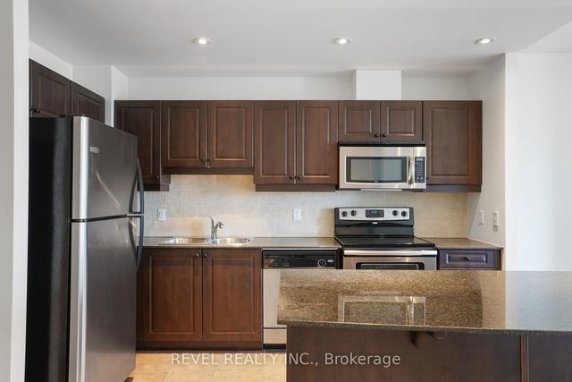 405 - 37 Ellen St, Condo with 2 bedrooms, 2 bathrooms and 1 parking in Barrie ON | Image 2