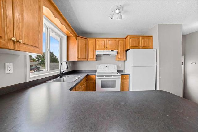 6704 Marler Drive, House detached with 4 bedrooms, 2 bathrooms and 2 parking in Camrose AB | Image 6