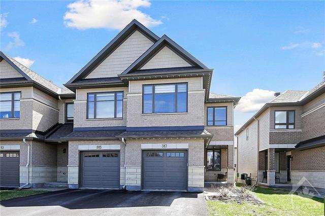 317 Proud Walk Drive, Townhouse with 3 bedrooms, 3 bathrooms and 3 parking in Ottawa ON | Image 1