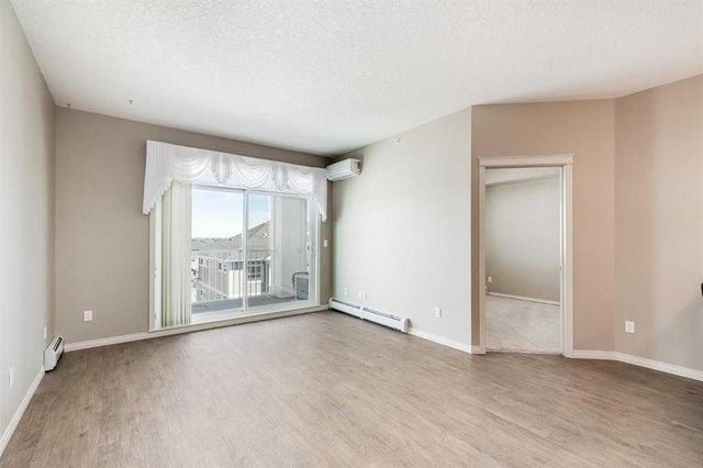 1407 - 522 Cranford Drive Se, Condo with 2 bedrooms, 2 bathrooms and 1 parking in Calgary AB | Image 8