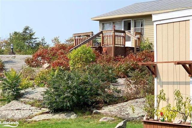 1465 Riverside Drive, House detached with 6 bedrooms, 2 bathrooms and 6 parking in Parry Sound, Unorganized, Centre Part ON | Image 15