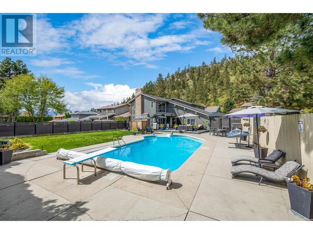 1047 Cascade Place, House detached with 4 bedrooms, 2 bathrooms and 6 parking in Kelowna BC | Image 8