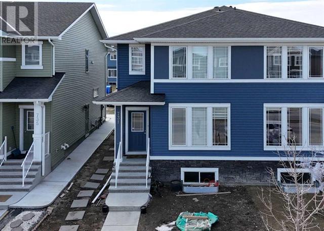 731 Redstone Drive, House semidetached with 3 bedrooms, 2 bathrooms and 2 parking in Calgary AB | Image 1