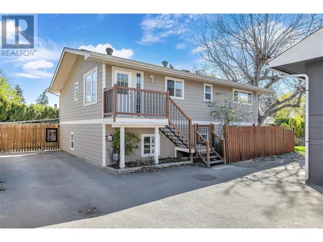 855 Saucier Avenue, House detached with 4 bedrooms, 2 bathrooms and null parking in Kelowna BC | Image 1