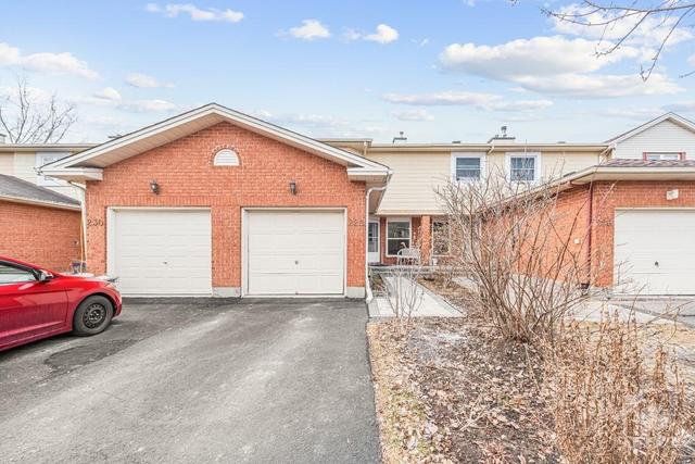 228 Huntersfield Drive, Townhouse with 3 bedrooms, 2 bathrooms and 2 parking in Ottawa ON | Image 1