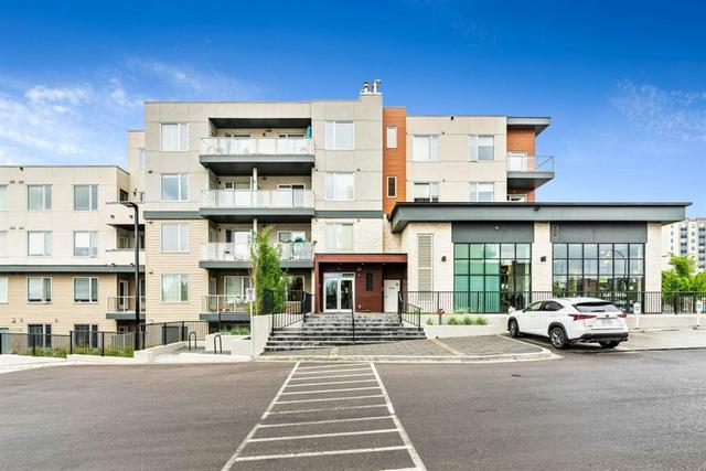 208 - 30 Shawnee Common Sw, Condo with 2 bedrooms, 2 bathrooms and 1 parking in Calgary AB | Image 19