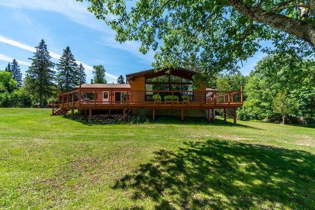 455 North Baptiste Lake Rd, House detached with 3 bedrooms, 3 bathrooms and 10 parking in Hastings Highlands ON | Image 1