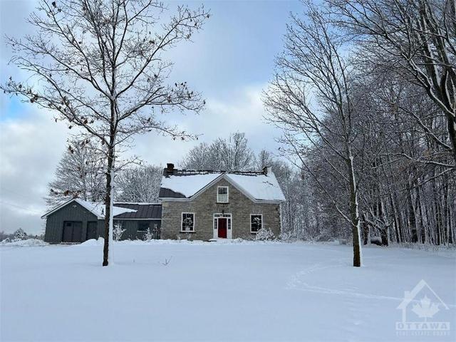 402 Lower Spruce Hedge Road, House detached with 4 bedrooms, 2 bathrooms and 8 parking in Greater Madawaska ON | Image 1