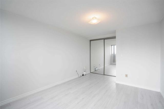 1003 - 11 Wincott Dr, Condo with 2 bedrooms, 1 bathrooms and 1 parking in Toronto ON | Image 7