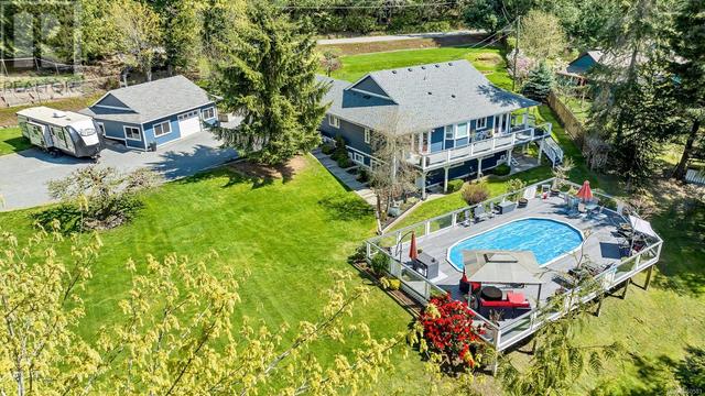 Welcome to 7970 Richards Trail. A beautifully maintained, updated and well loved .98 acre slice of paradise | Image 1