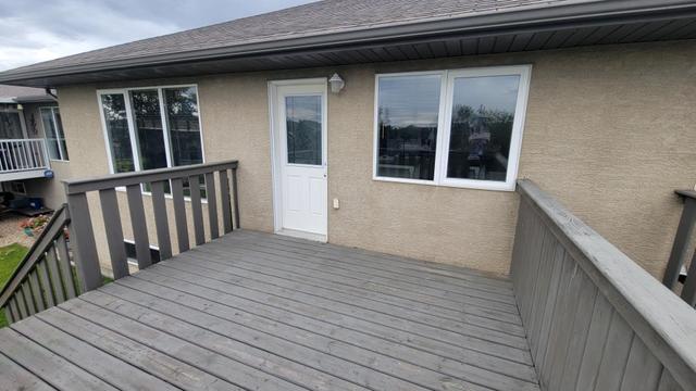 27 - 8910 122 Avenue, Home with 4 bedrooms, 3 bathrooms and 4 parking in Grande Prairie AB | Image 33