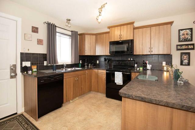 96 Bowman Circle, Home with 3 bedrooms, 1 bathrooms and 2 parking in Sylvan Lake AB | Image 3
