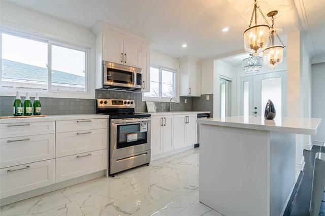 152 Lindy Lou Rd, House semidetached with 4 bedrooms, 2 bathrooms and 4 parking in Toronto ON | Image 5
