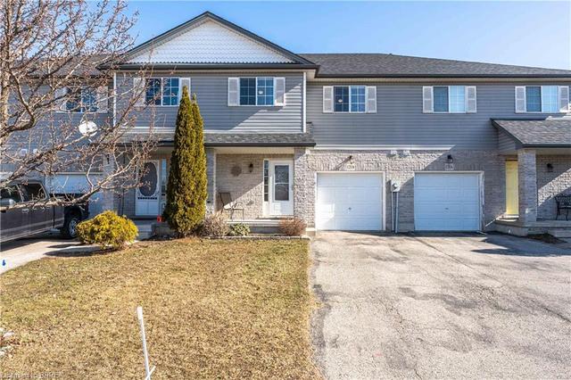 121b Whitlaw Way, House attached with 3 bedrooms, 2 bathrooms and 3 parking in Brant ON | Image 1